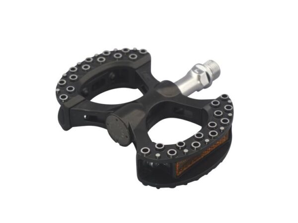 An MKS Lambda Pedal is shown in a black finish with an unusual double C shape stepping area & little octopus-like cups providing grip on the pedal surface