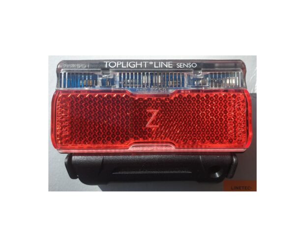 A B+M Toplight Line Senso battery powered rear bike light is shown with a red reflector panel & upper white reflector too