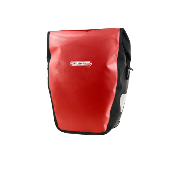 An Ortlieb Back-Roller Core bicycle pannier is shown in a red& black tarpaulin-like fabric with white branding logo