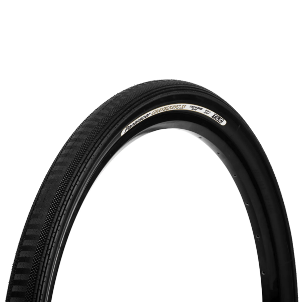 A Panaracer Gravelking SS tyre in solid black is shown with branding on the sidewall.